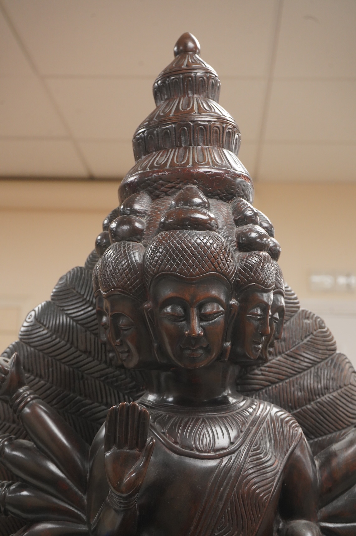 A large carved Ceylonese “Hindu Buddha” 108cm high